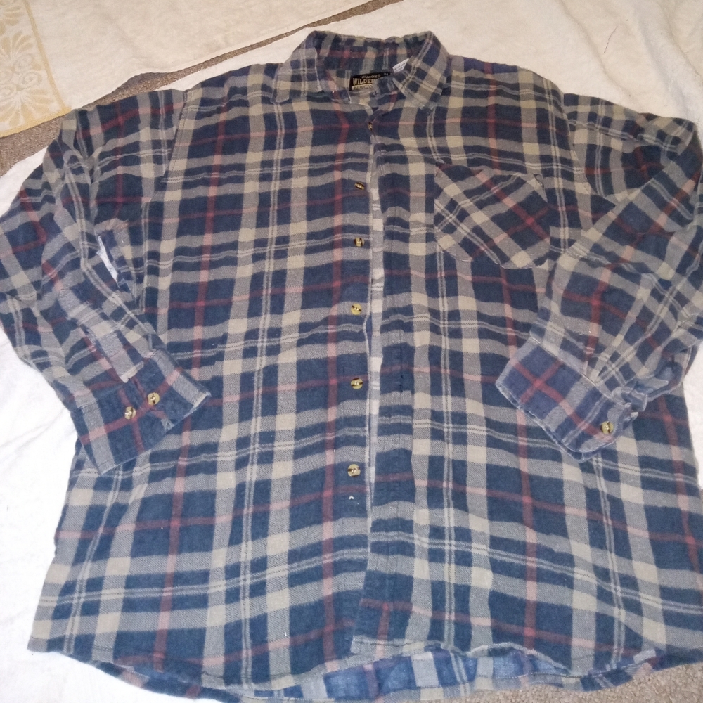 Rugged Wilderness Flannel...vintage...size is large...black and brown plaid